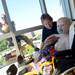 Ironman is seen washing a window as Heather Wills, of Ortonville, smiles while her 2-year-old son Noah watches Spiderman on the 11th floor at C.S. Mott Children's Hospital on Monday, June, 3, 2013. Melanie Maxwell I AnnArbor.com